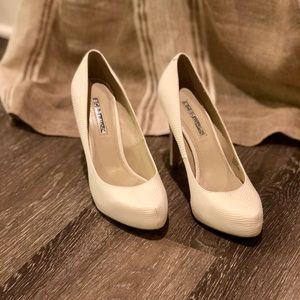BCBG Parade Platform Pumps in white